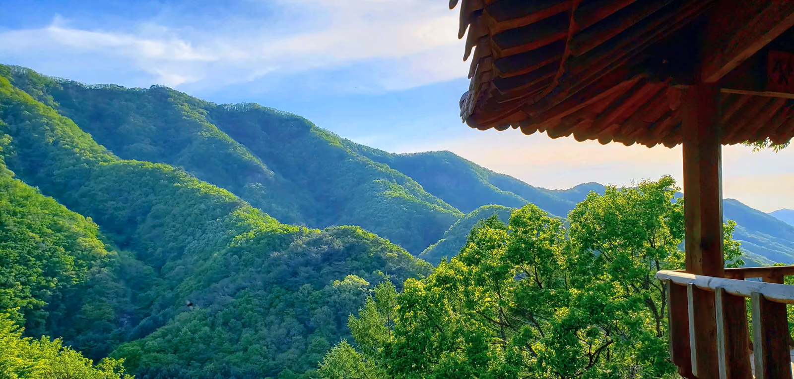 Forested mountains of Geumsan, Korea, seen from a traditional pavilion